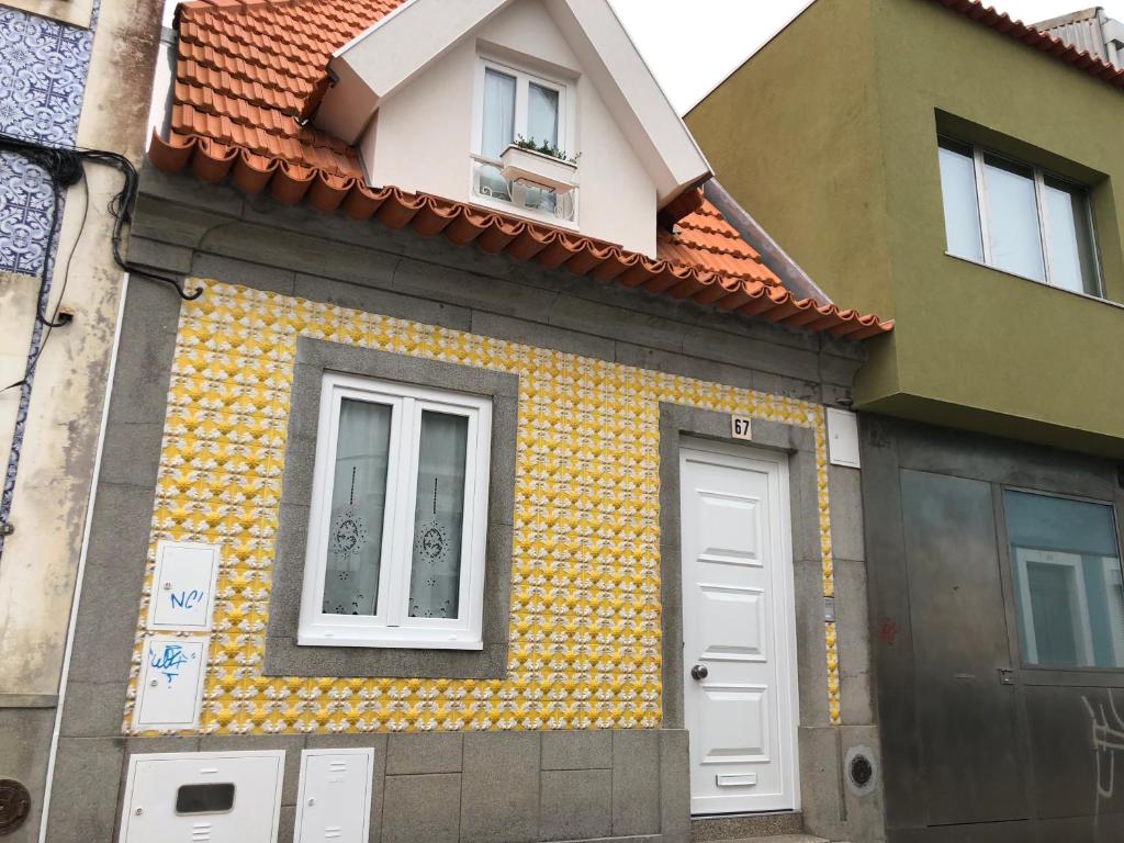 YELLOW TILED HOUSE