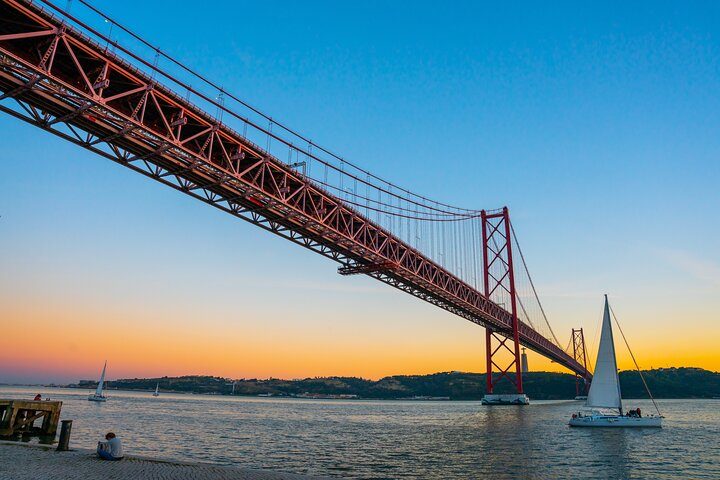 Charms of Lisbon: Alfama Tapas Tour & Sunset Sailing with Wine