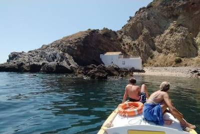 Coastal Boat Trip - Caves and Deserted Beaches