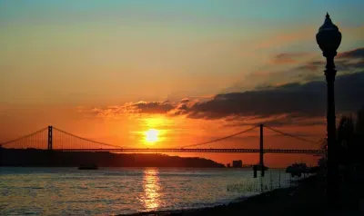 Sunset over Lisbon 25 Abril bridge