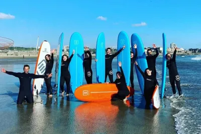 Small Group Surfing Experience with Transportation in Porto