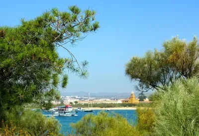 View back from Ilha de Tavira to mainland and island ferry