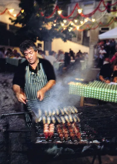 Sardines being grilled - Lisbon festival