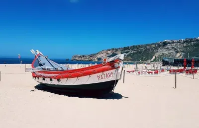 Traditional Nazare fishing boat on beach