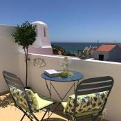 Tranquil Benagil apartment with sea views, pools and beach 200m