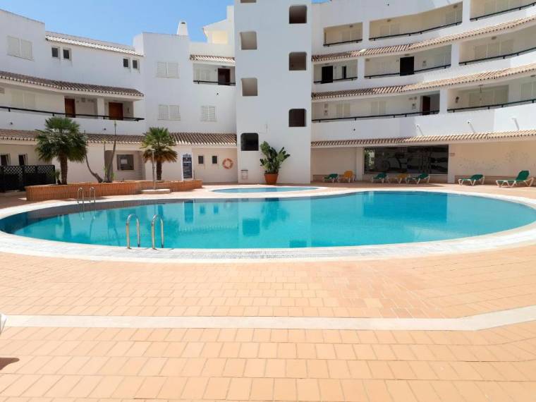 Apartment with one bedroom in Armacao de Pera with wonderful sea view shared pool furnished garden 100 m from the beach