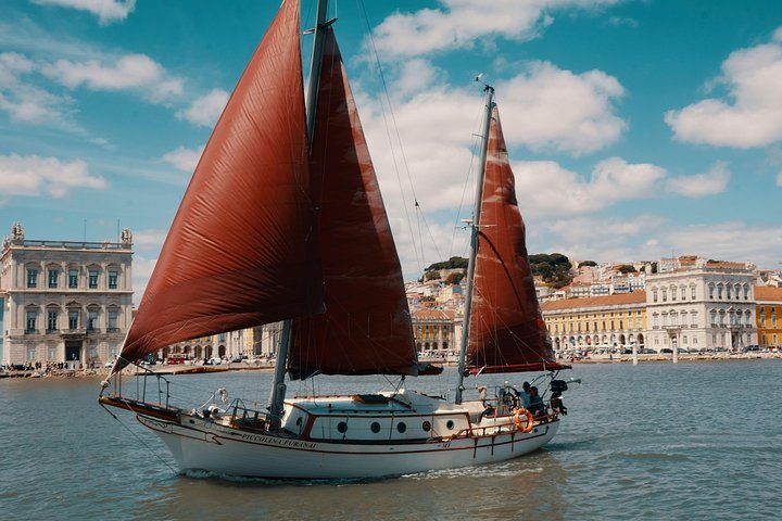 Sunset in Lisbon on a Lovely Vintage Sailboat