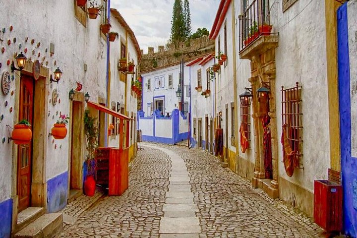 Faith and Heritage: Fátima Batalha Nazaré and Óbidos Private Tour from Lisbon